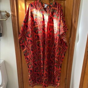 Red and Green Satin Cape Dress with Intricate Patterns